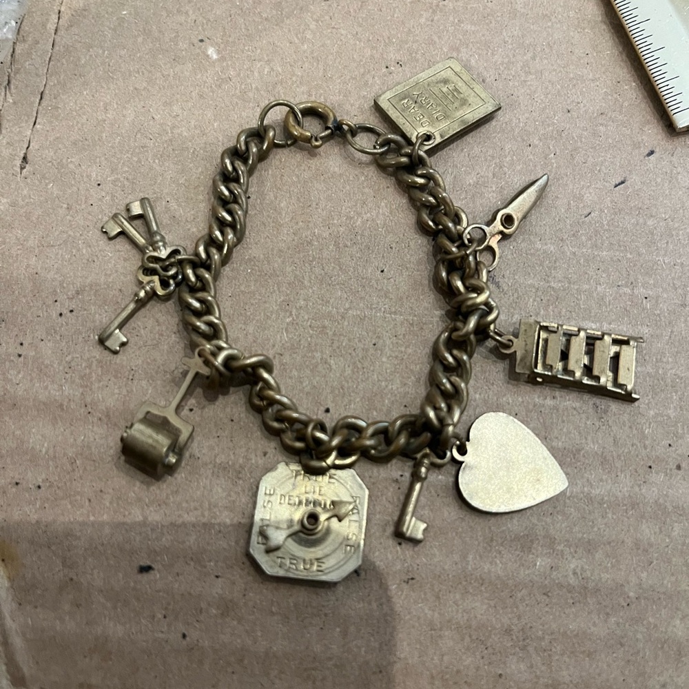 Vintage Goldbrass  Charm Bracelet truth spinner and diary/keys,